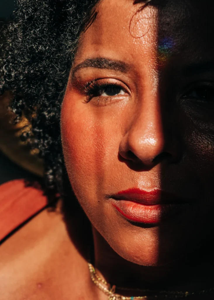 Portrait in warm November light with dramatic shadows.