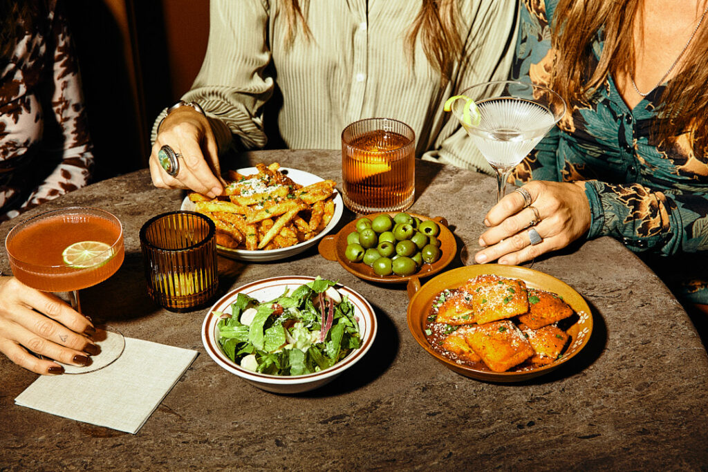 Foxtail Bar photography lifestyle table scene with cocktails and shareable food